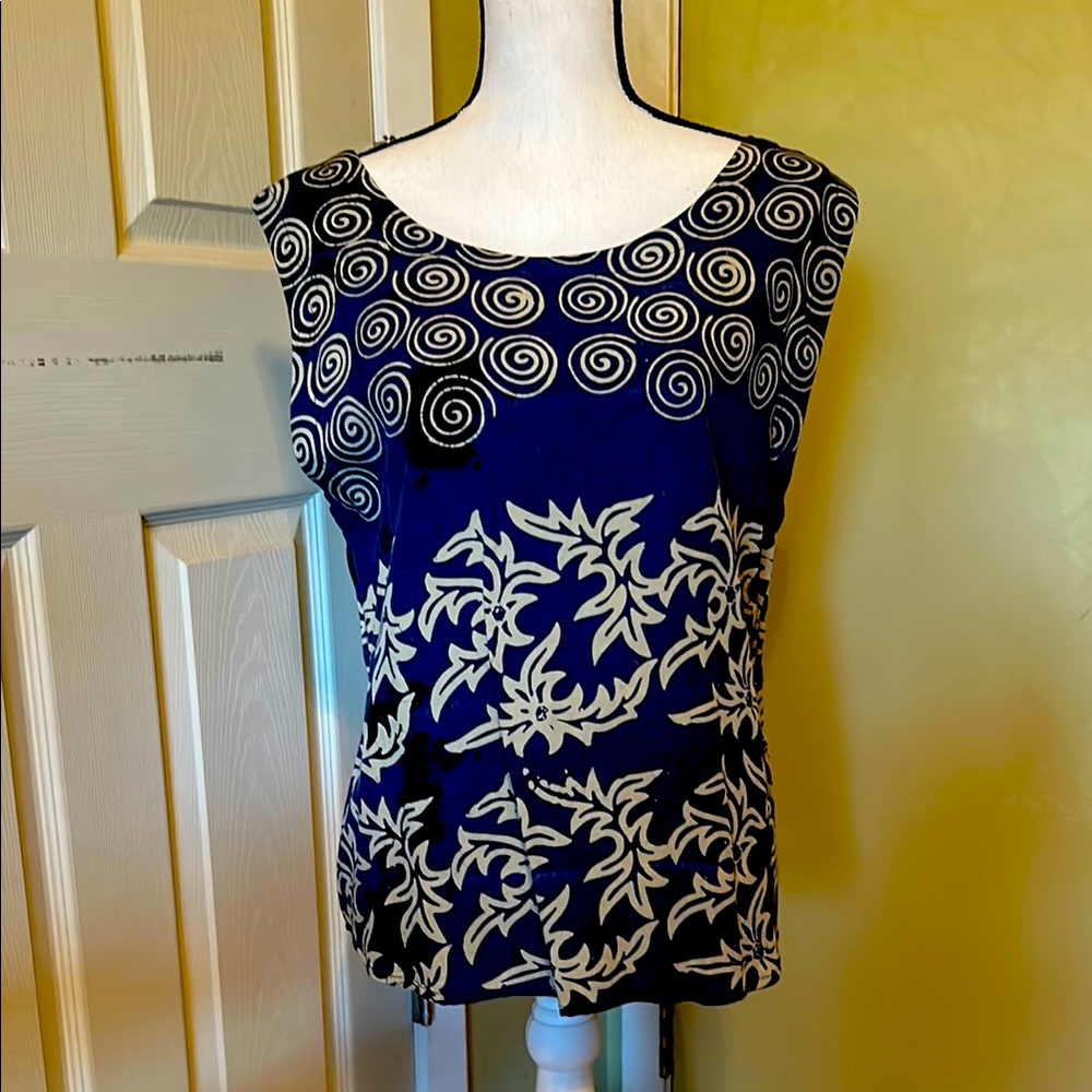 Never worn without tags. Two piece.